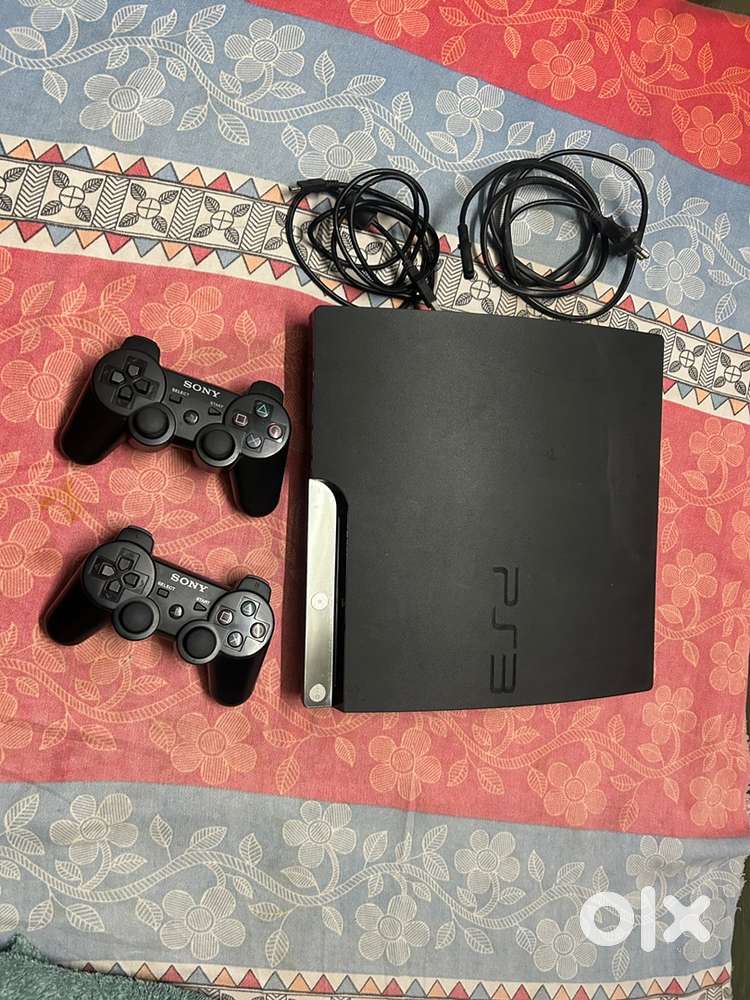 Play station 3 console with two wireless remotes