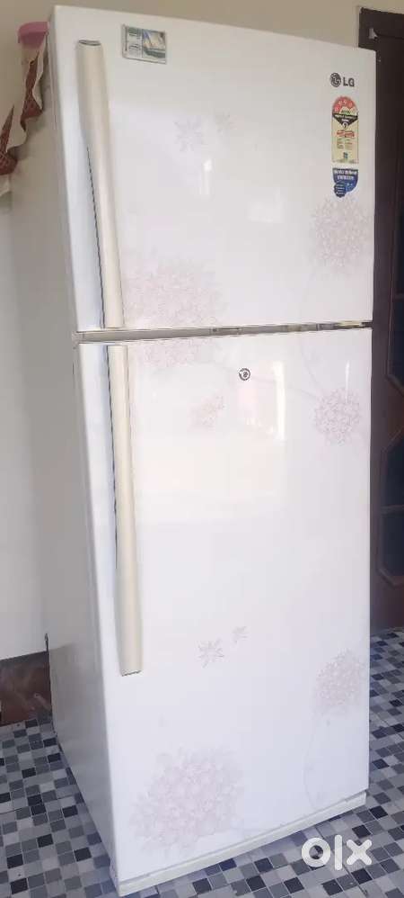 LG white fridge with pink flowers
