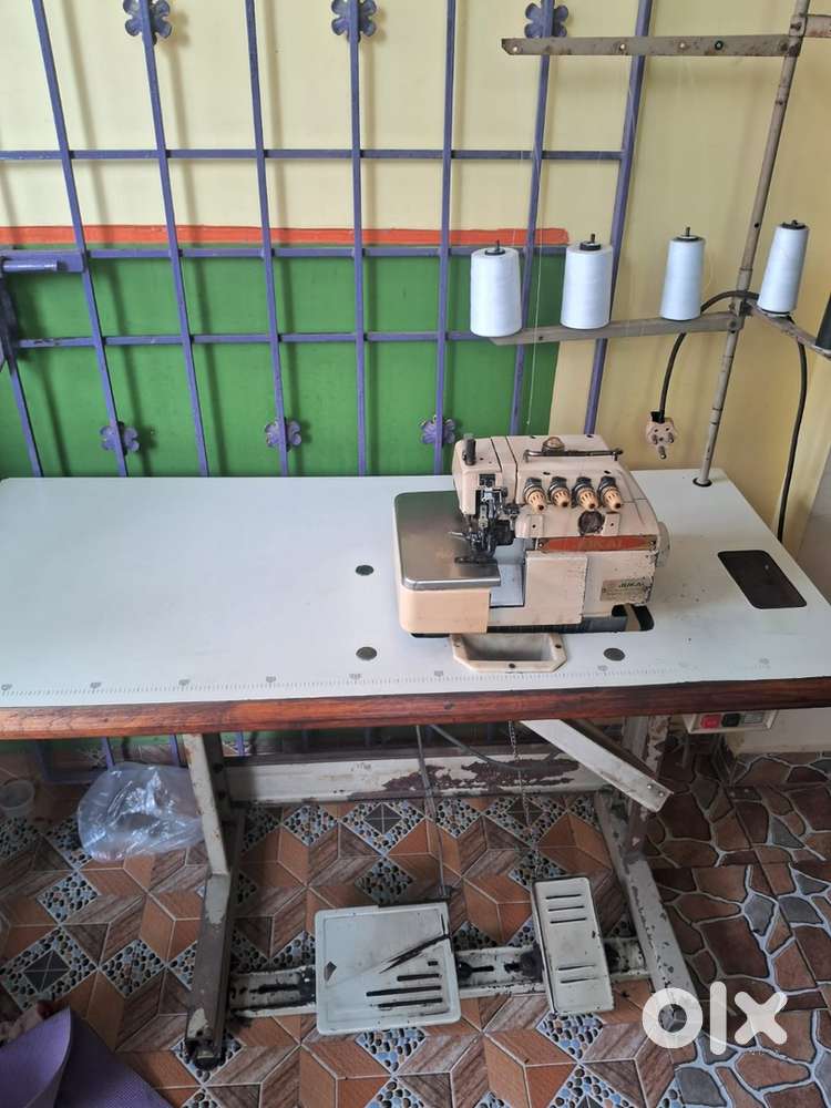 Over lock 5 thread TAILORING MACHINE