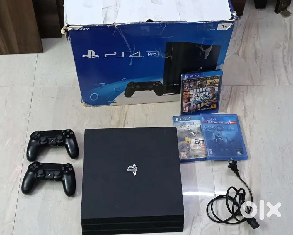 PLAY STETION 4 PRO ( 3 ).GAMES  CD AND .(2) WIRELESS CONTROLLER
