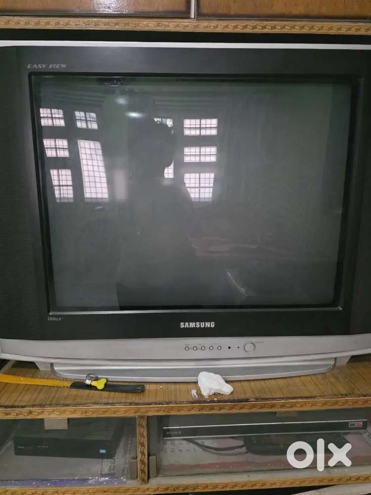 TV,TV almirah,  DVD and set top box
