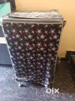 Whirlpool washing machine top load with 6.5kg And with stand