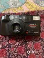 Yashica camera , three batteries and  camera is in working condition