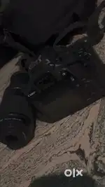 Canon 1300d with long lens bag And charger