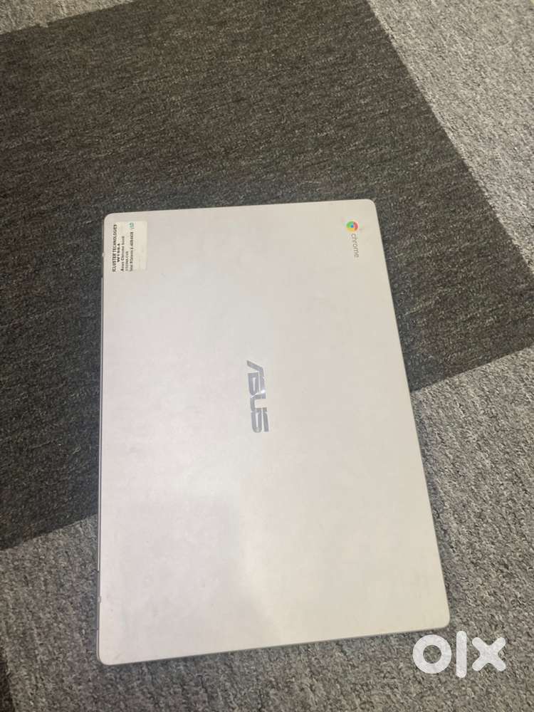 Asus chrome book /chromeOS/4gb/64SSD/intel R/celeron/with warranty&bil