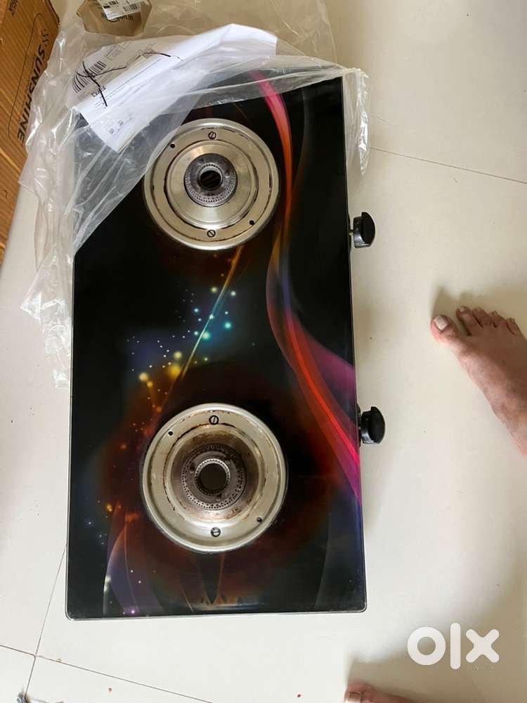 Gas stove with glass top