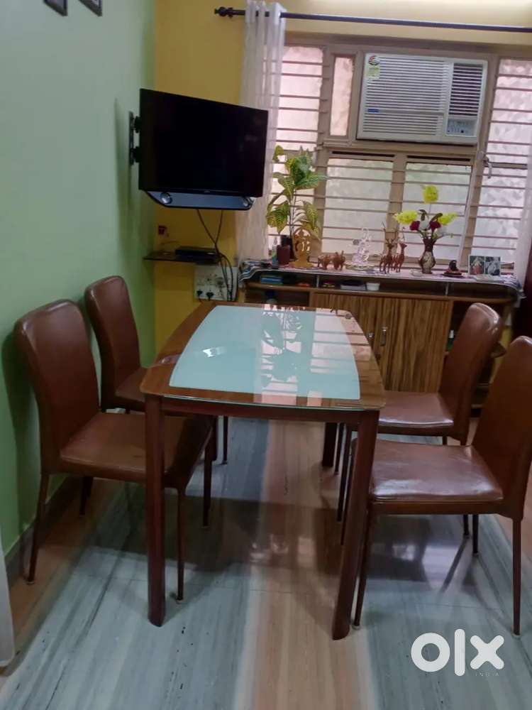 DINING TABLE (5 YEAR OLD) IN PERFECTLY GOOD CONDITION