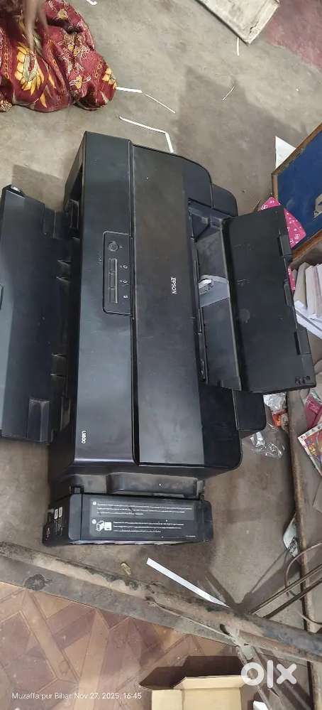 Epson printer model no. L1800 , three years old, only 1700 print used