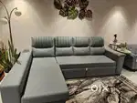 Sofa comebed with attached pillow and longer with storage and beautifu