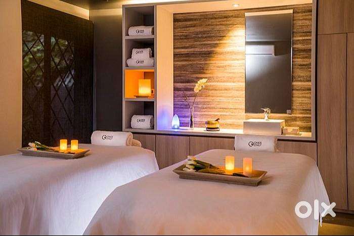 Female spa therapist and receptionist