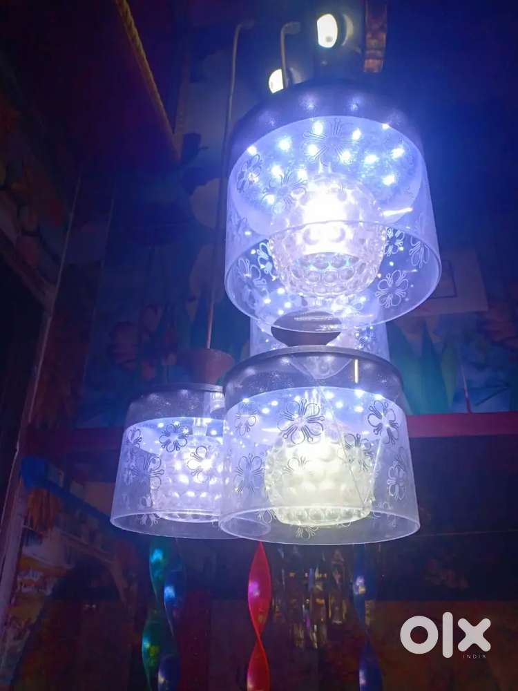 Beautiful hanging four lamps changing lights jhuar