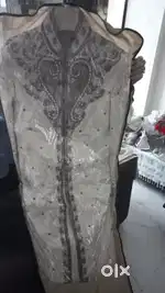 Beautiful Sherwani of Manyawar Brand golden colour with embroidery