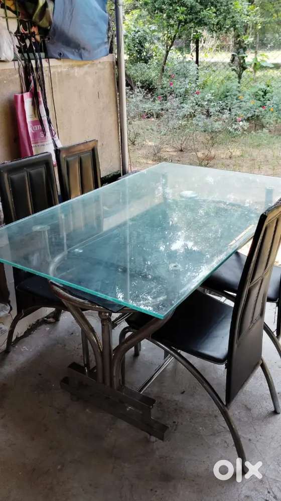 4 seater glass top dining table