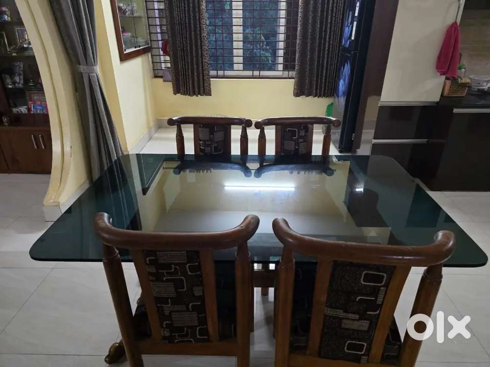 FOUR SEATER GLASS TOP TEAKWOOD DINING TABLE