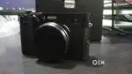 Sony alpha 7S Mark ii with 50mm lens and faujifilm X100V1 camera