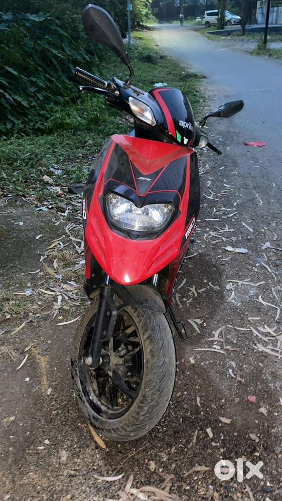 Red colour first owner aprilla