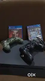 PlayStation 4 slim edition plus games and 2 controllers