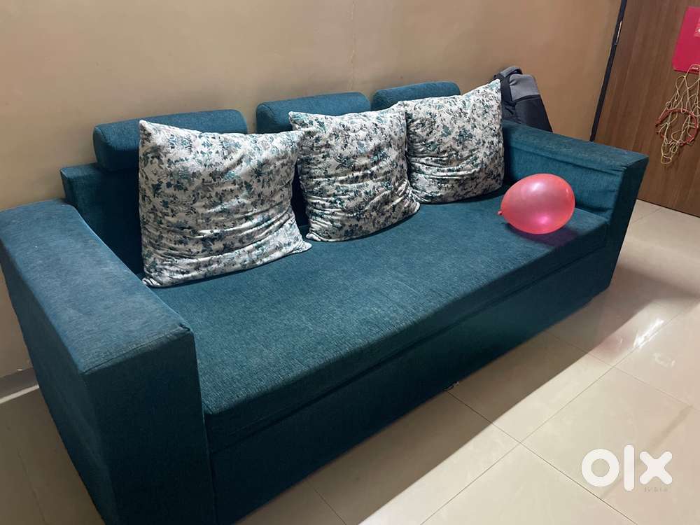 3 seater sofa cum bed along with 2 single sofa
