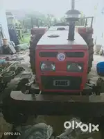 Tractor with Rooter and Threshar Machine