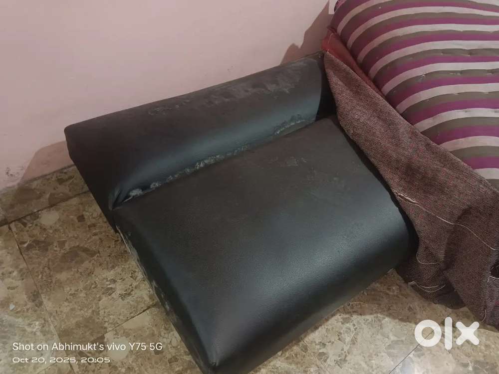 Sofa cum bed 6 ft long leather type old but still ok
