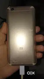 Redmi 5A ache. 1500 taka. NUMBER deo