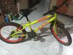 Atlas brand bicycle, likely a children's model, given its size