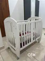 Babyhug compacto 3 in one cot,rocker cum study table