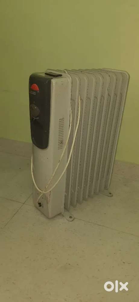 Usha company Nine fin oil Heater.