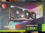 2and hand MSI RTX 4090 GAMING X TRIO Graphics card.