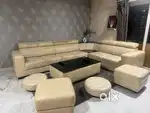 Beige sofa 6 seater and white dining table