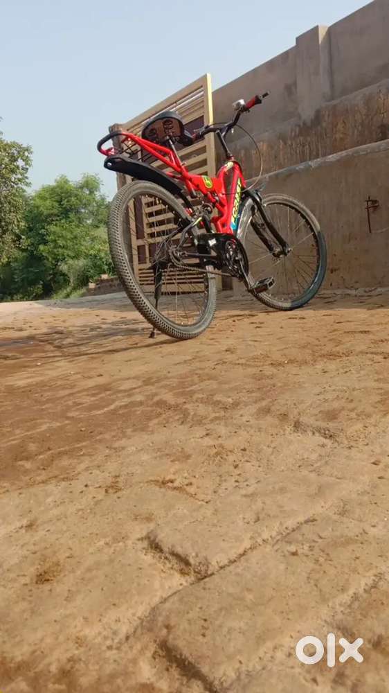 New tire , jyoti company , red colour, black rim