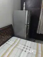 Fridge of gray color fully functional .