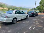 Selling 2 Cars Mitsubishi Cedia , Lancer Petrol