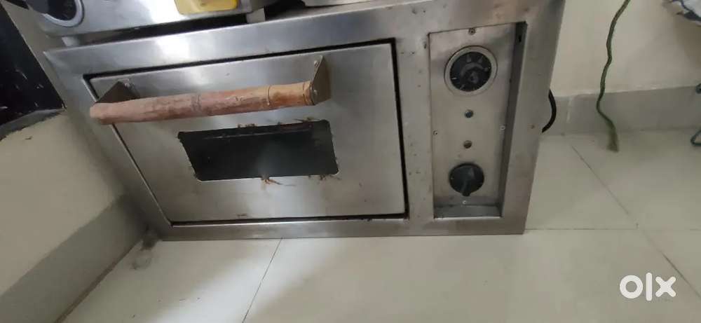 Oven and toaster machine