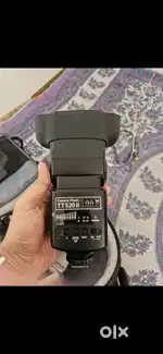 Godox flashlight with battery battery charger and digitek diffuser