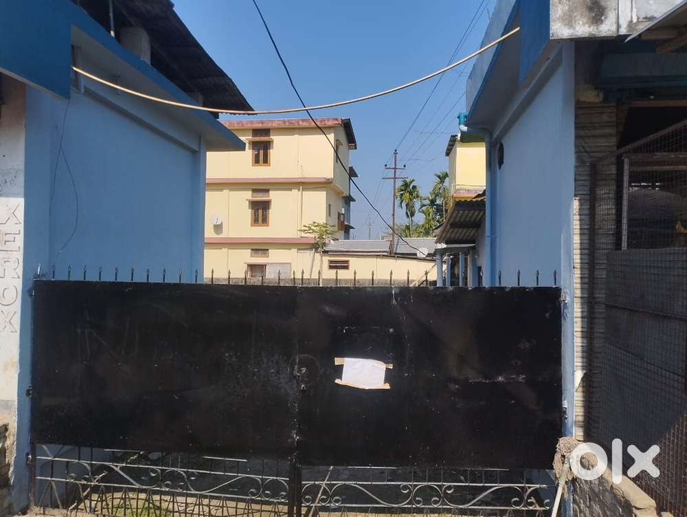 Road side Two Assam type house  with 1 katha free space