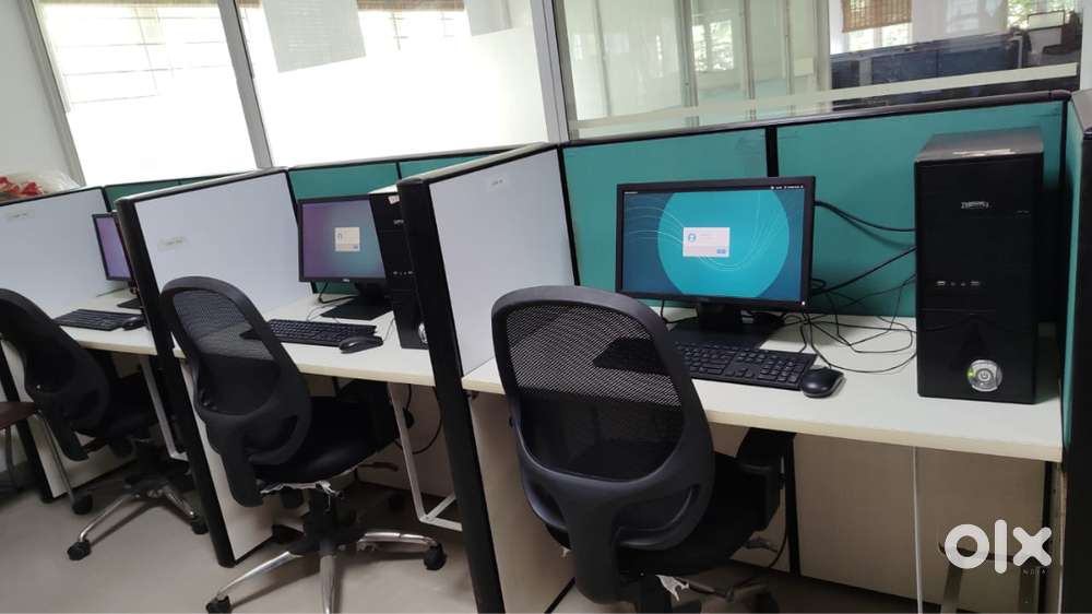Modular partition ,  computers , monitors, chairs
