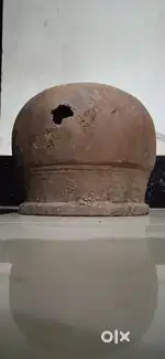 Mud pot with hole