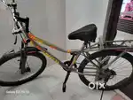Full size Cycle in  new condition with disc brakes and carrier.