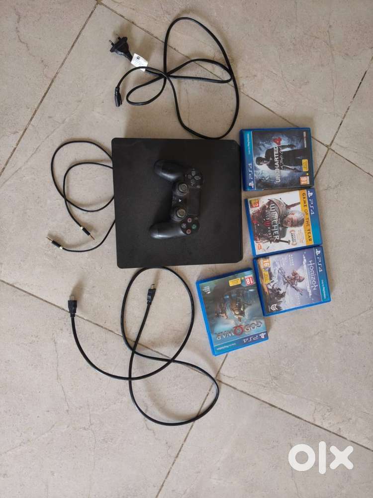 PS4 slim 1 tb console with games