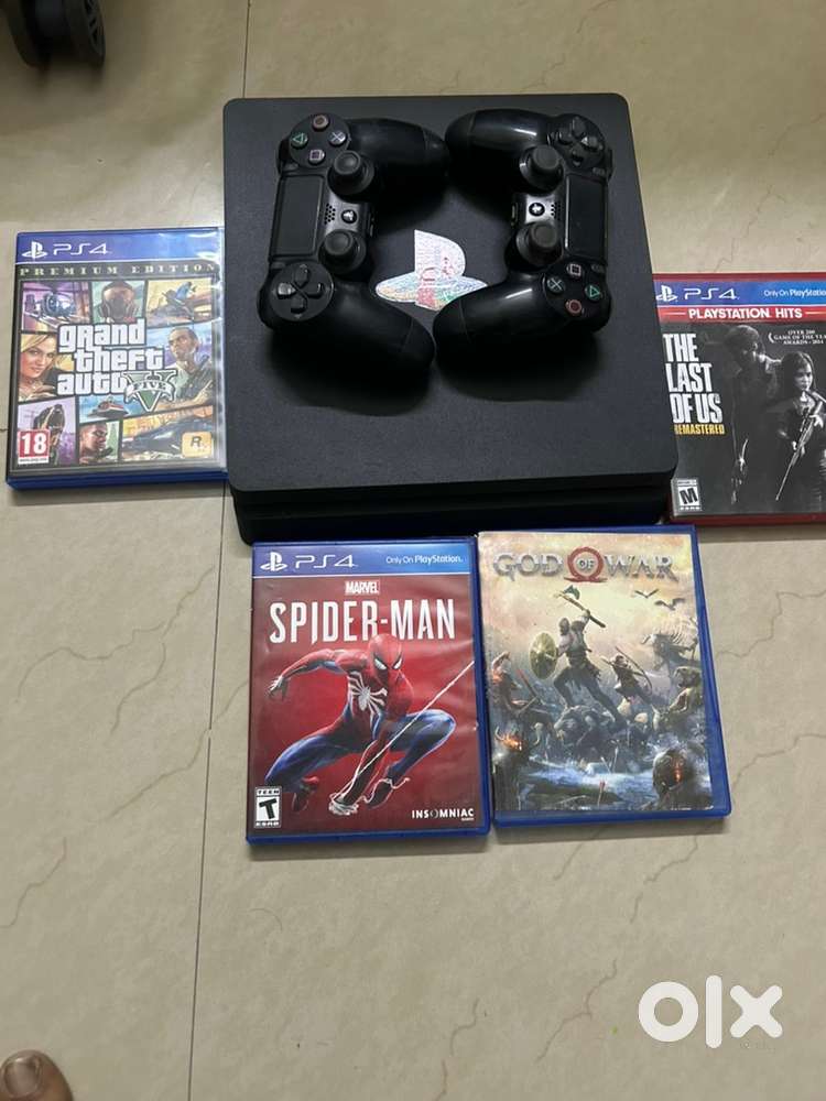 PS4 with 2 new controllers and 4 games