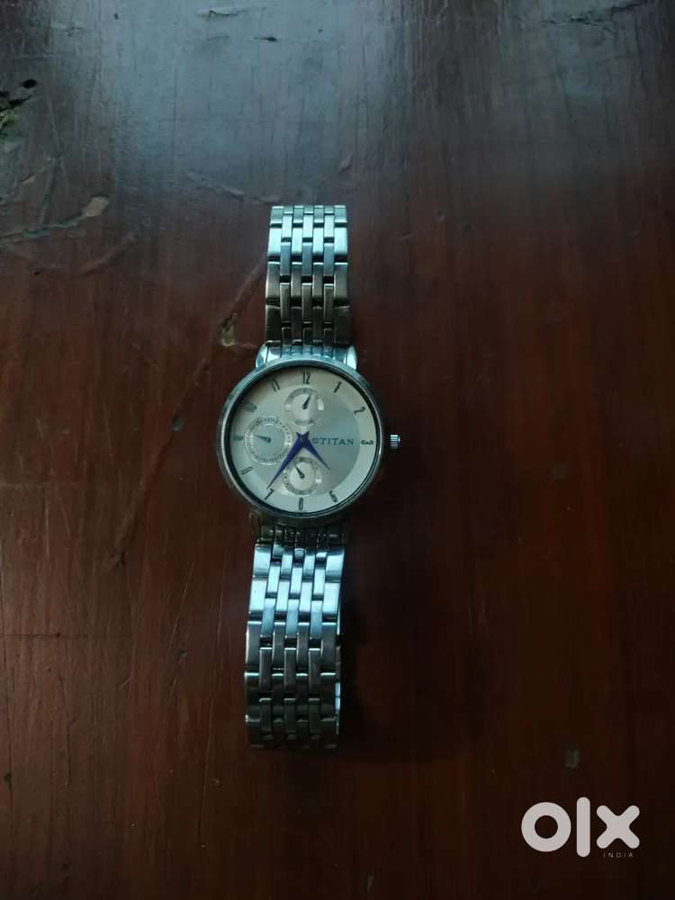 Titan NM2569SM03 Neo analog women's watch.