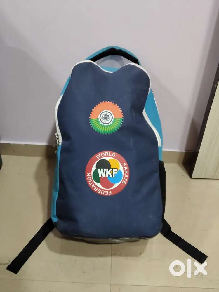 Karate kit with dress bag and white and yellow belt.