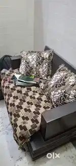 Want to sell 7 seater Sangwan wood sofa with glass top centre table