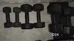 A pair of 1kg, 2.5kg and 5kg dumbbells
