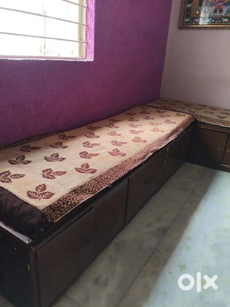 Sofa also some storage space including sitting