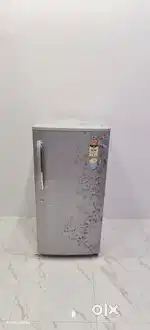 Single door silver colour flower model refrigerator in warranty