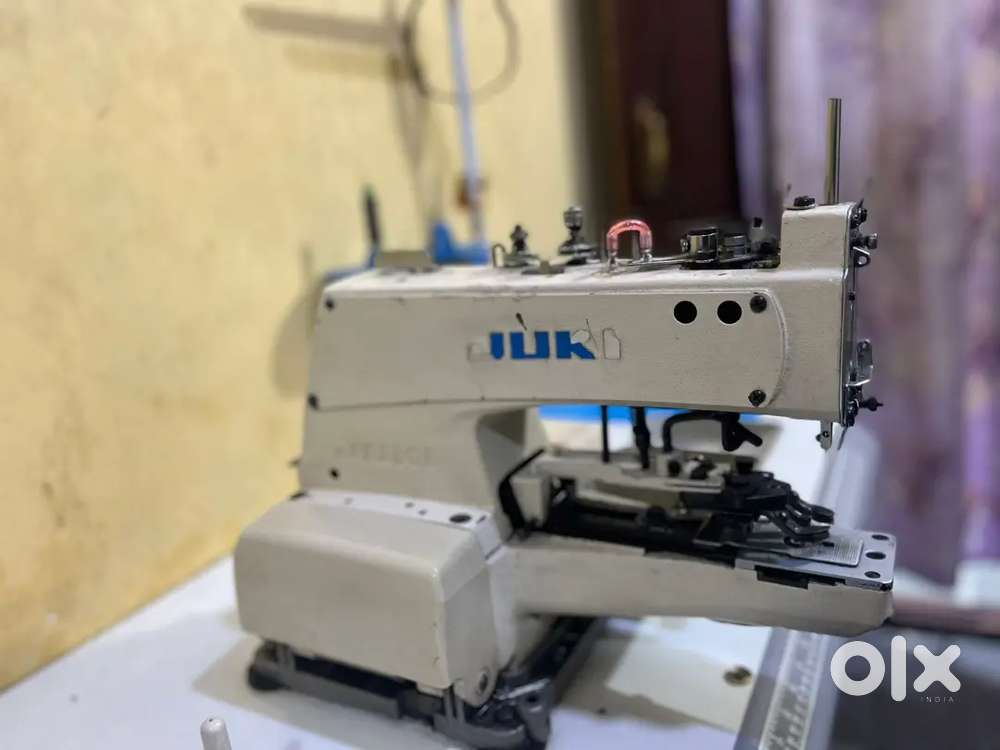 Juki button machine
