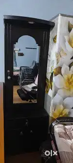 Bed with mattress and dressing table