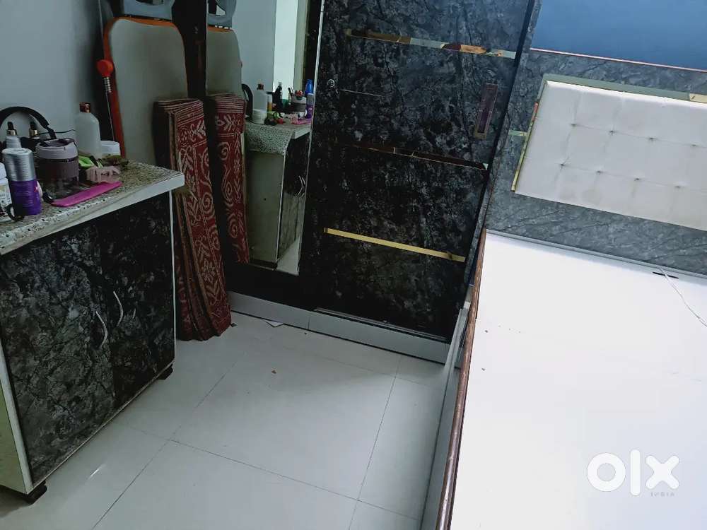 Two year old  wooden bed+ wordrobe +dressing cabinet